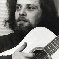 Portrait with guitar 1980